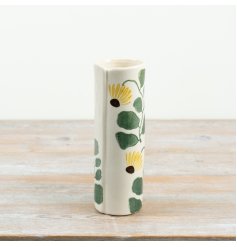 Infuse your space with nature’s charm using this delightful yellow and green ceramic vase