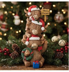 Get in the xmas spirit with this cute highland cow family stack ornament