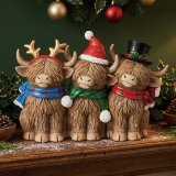 A delightful ornament capturing the charm of Highland cows for festive decoration