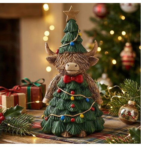 Bring a touch of cheerful country charm to your festive table with this delightful Highland Cow ornament