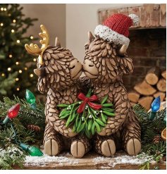 a charming resin highland co ornament