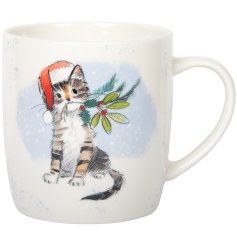 Sip in style with this charming mug featuring a festive kitten and juicy berries