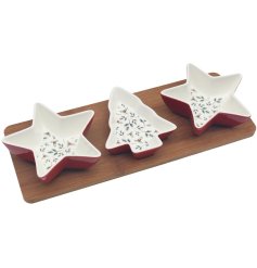 Charming stars and tree patterned dishes with coordinating tray, perfect for festive entertaining