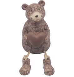 Add a playful and cosy touch with this adorable bear shelf decoration