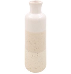 a natural earthy vase featuring three warm tones