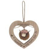 A wooden family highland cow tree hanger 