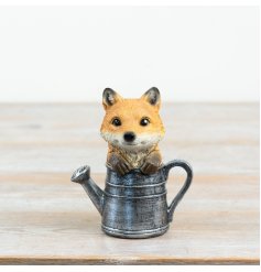 Inject a charming woodland vibe into your decor with this delightful fox figurine