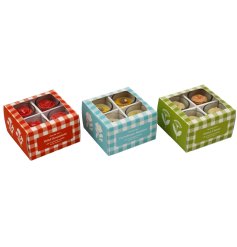 Enjoy the cosy glow and enchanting scents of four lovely flower-inspired candles