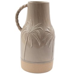 Bring a touch of tropical elegance to your space with this stylish palm tree embossed vase