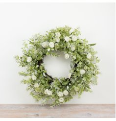 a charming spring clower and eucalyptus  wreath