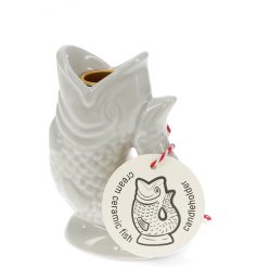 add a touch of coastal with this charming fish taper candle holder 