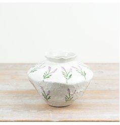  Beautiful sprigs of purple lavender with soft green leaves evoke a peaceful, garden-inspired aesthetic.