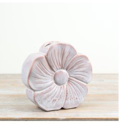 Eyecatching multi-petal flower shape brings a fresh, playful botanical aesthetic to your interior styling.