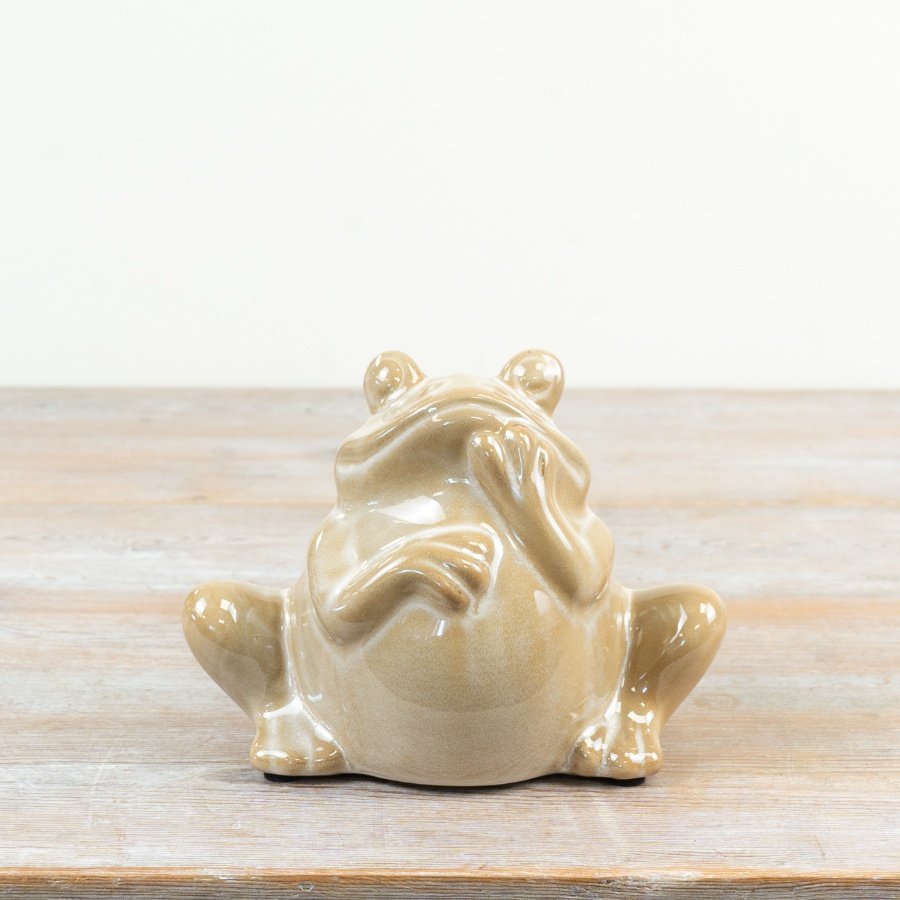 a delightful glossy ceramic frog in a charming seated pose