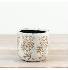 Bring a charming vintage feel to your greenery with this lovely earthy botanical planter