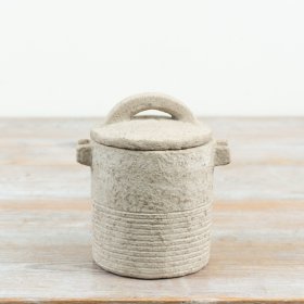 introduce a touch of countryside warmth with this rugged, earthy storage pot with lid