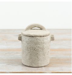 introduce natural earthy tones to your space with this charming lidded storage pot