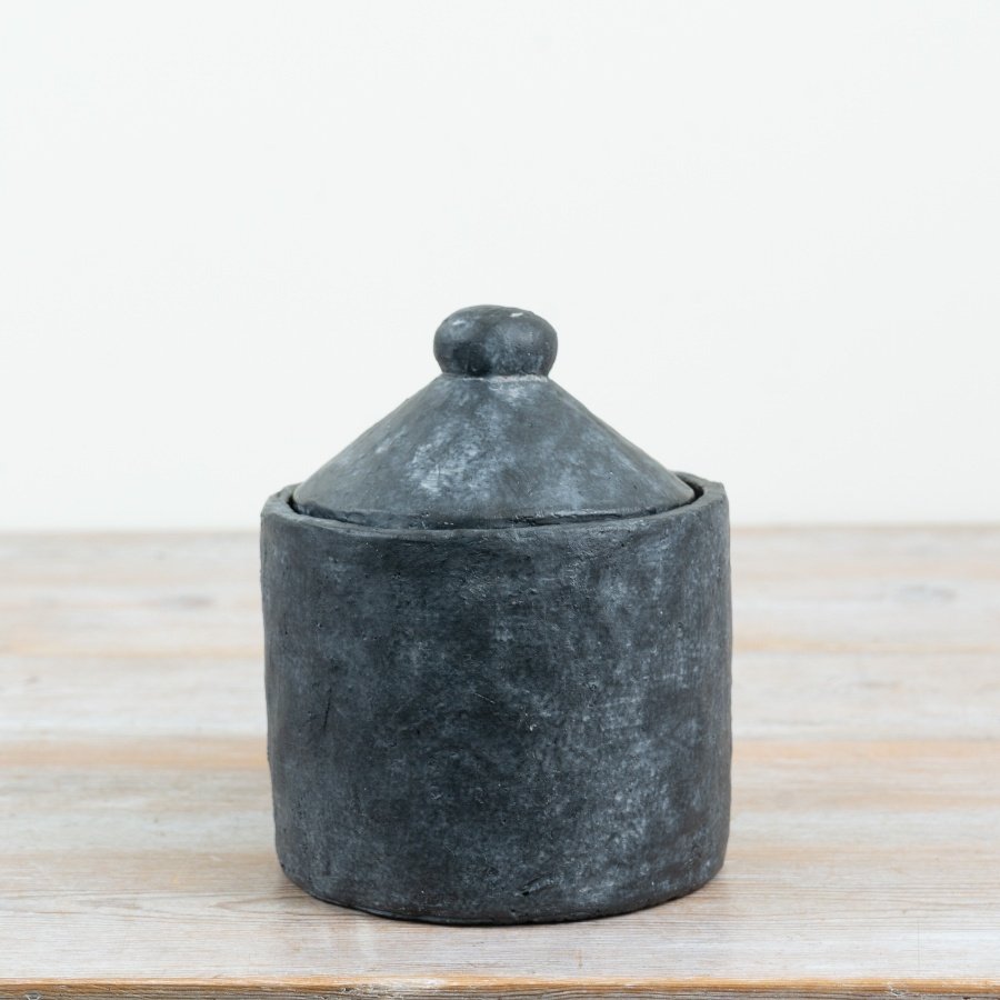 Stylish black rustic pot featuring a practical lid for organised storage