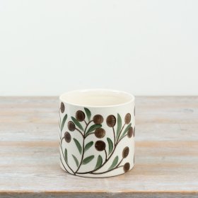 a beautifully hand painted planter with an elegant olive design