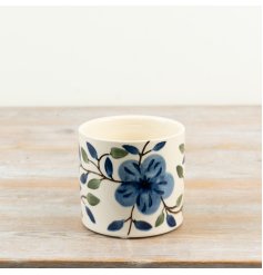 delightful blue flower planter with classic charm