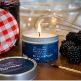 Fill your home with the rich, fruity aroma of blackberry jam with this charming tin candle