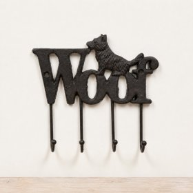 Delightful cast iron dog hooks offering a blend of practicality and decorative appeal