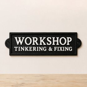 classic black cast iron wall plaque for workshops or sheds