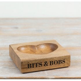 a charming wooden  heart-shaped key and trinket holder tray 
