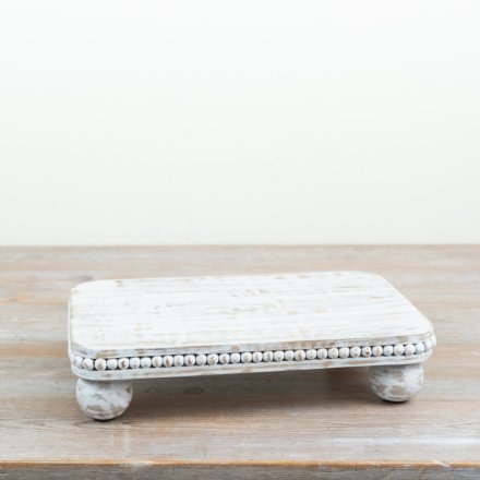 Elevate your serving style with this elegant white wash wooden tray with sturdy feet
