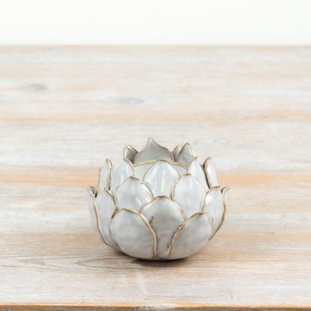a small lotus flower candle holder 