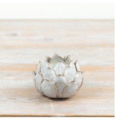 a small lotus flower candle holder 