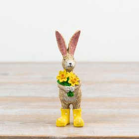 Celebrate the charm of spring with this delightful rabbit ornament in cheerful yellow boots