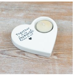 This stylish candle holder is in a smooth glazed heart design 