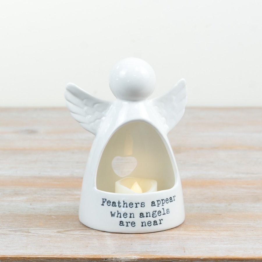 Add a soothing reminder of love and comfort to your space with our Ceramic Angel Candle Holder