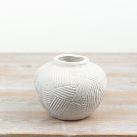 elegant white vase with a distinctive cross-hatched texture