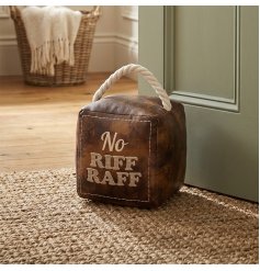 Charm your space with this cheeky, embroidered door stop that speaks volumes