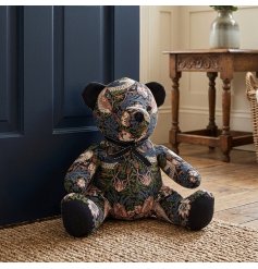 This charming doorstop is sculpted into the timeless silhouette of a teddy bear