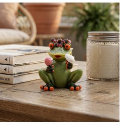 a charming frog figurine enjoying some self-care moments