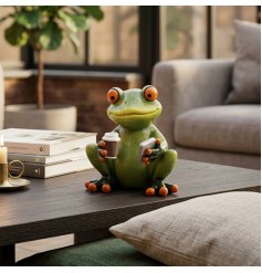 This delightful piece is a comical coffee-drinking and smartphone-holding frog figurine