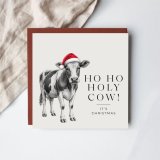 Bring joy and laughter this festive season with our quirky Ho Ho Holy Cow Christmas card