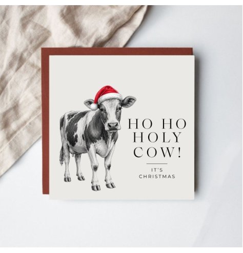 Share smiles and festive fun with this amusing Ho Ho Holy Cow Christmas card