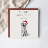 Spread festive cheer with this charming dog-themed Merry Woofmas Christmas card