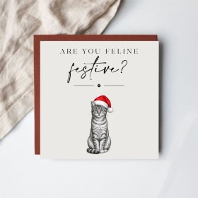 Share a merry message with this adorable cat Christmas card