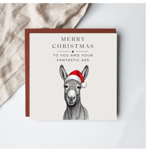 A playful and delightful festive card with a donkey donning a Santa hat