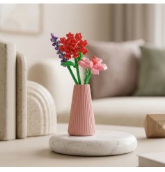 an enchanting mini brick block kit featuring a flower in a vase