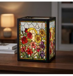 Brighten your home with a colourful stained glass flower tealight that radiates warmth and charm