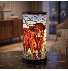 Bring a charming, warm glow to your home with our Highland Cow stained glass lamp