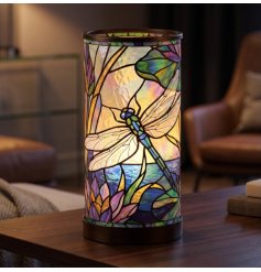 Brighten your home with the colourful shimmer of a dragonfly stained glass lamp