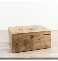 a rustic "Treasured Memories" engraved wooden keepsake box