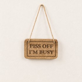 A cheeky wooden sign to brighten any space